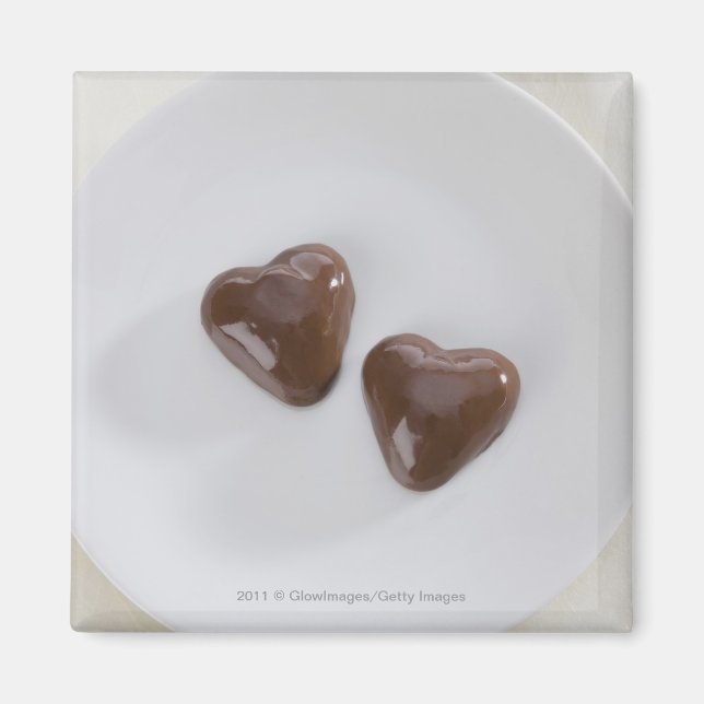 Imán Cadenas de chocolate con forma de corazón en un pl (Frente)