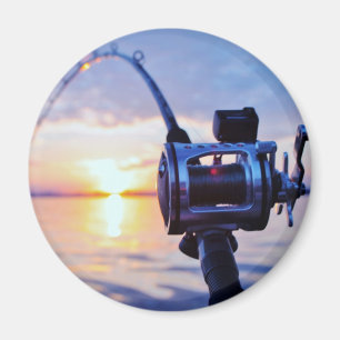Imán Carrete de la pesca en la puesta del sol