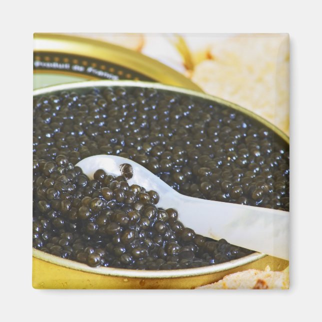 Imán Caviar negro y una cuchara de nácar para (Frente)