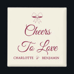 Imán Cheers To Love Burgundy Script Ivory Bow Wedding<br><div class="desc">An elegant,  classic magnet featuring a delicate bow graphic and rich burgundy script on soft cream paper.</div>