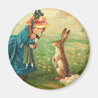 Imán Chica con muñeca y conejo venado de Pascua