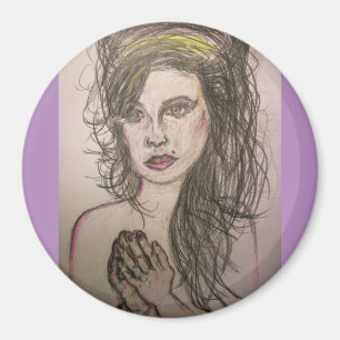 Imán chica con pelo de colmena rezando