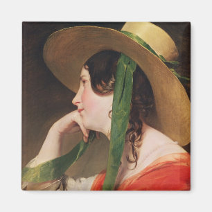 Imán Chica en un gorra de paja amarillo,