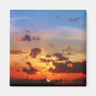 Imán Cielo azul y puesta del sol roja