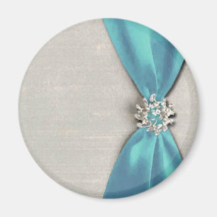 Imán cinta de satén azul con la copia de la joya