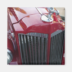 Imán coche rojo del vintage con el ornamento de la