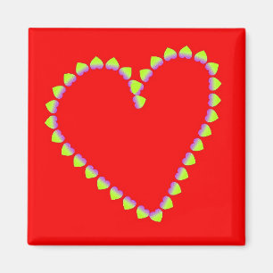 Imán Corazón formó corazones sobre rojo