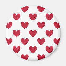Corazones de polka roja en blanco