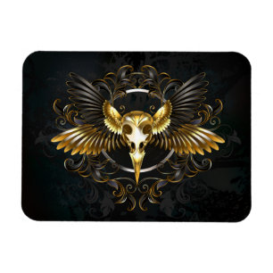 Imán Cráneo de pájaro dorado sobre fondo negro