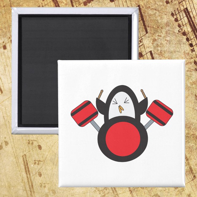 Imán Cuidad musical de tambor de pingüino (A magnet with a cute penguin playing the drums.)