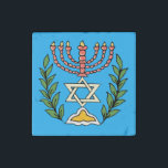 Imán De Piedra Magen persa David Menorah<br><div class="desc">Esta imagen fue adaptada de una antigua teja judía persa y cuenta con una menorah con un Magen David (Estrella de David) enmarcado por ramas de olivo. Se han conservado las imperfecciones de la imagen original pintada a mano.</div>