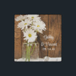 Imán De Piedra Mason Jar y White Daisies Country Barn Boda<br><div class="desc">Personalizar estos encantadores imanes Mason Jar y White Daisies Country Barn Boda Stone con los nombres personales de la novia y el novio y fecha específica de la ceremonia matrimonial. Estos imanes bodas rústicos de estilo personalizado de moda presentan una pintoresca fotografía floral de un frasco de vidrio lleno de...</div>
