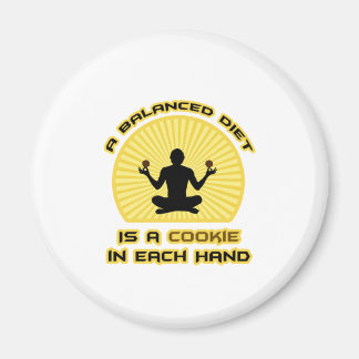 Imán Dieta equilibrada: cookie en cada mano