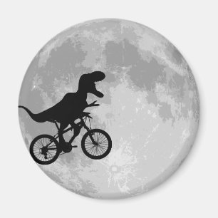 Imán Dinosaurio en bicicleta en cielo con luna