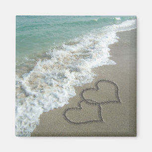 Imán Dos corazones de la arena en la playa, océano