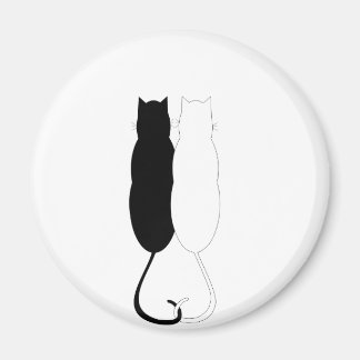 Imán Ebony y gatos de marfil