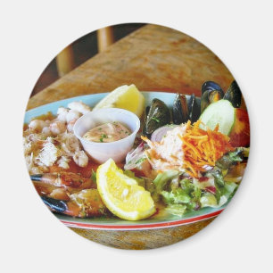 Imán El cangrejo agarra los discos de los mariscos de