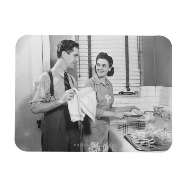 Imán El hombre y la mujer preparan platos (Horizontal)