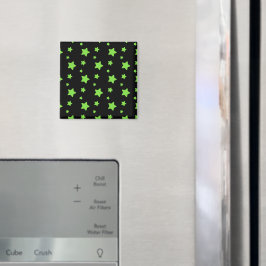 Imán Estrellas verdes sobre un patrón negro