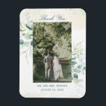 Imán Eucalyptus Greenery Foto Gracias Favor De La Boda<br><div class="desc">Elegante imán de agradecimiento boda botánico con tu foto favorita enmarcada con hojas de eucalipto y vegetación con un toque de azul y espinillas de falso purpurina de oro sobre un lavado de acuarela pastel. Arriba está "Gracias" en el guión y debajo están su apellido y fecha. Un diseño sencillo...</div>
