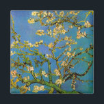 Imán Floreciente árbol de almendros por Vincent van Gog<br><div class="desc">El floreciente árbol de almendros de Vincent van Gogh es un bello post de arte vintage impresionismo de vida floral con flores florecientes en las ramas de un almendro en un jardín. El cielo azul está en el fondo. Sobre el artista: Vincent Willem van Gogh (1853-1890) fue uno de los...</div>