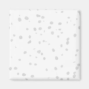 Imán fondo blanco con muchos puntos pequeños