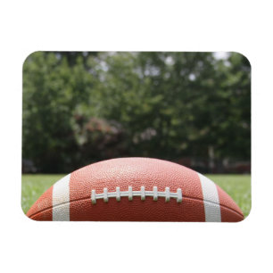 Imán Fútbol en verde cerrado de hierba