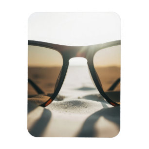 Imán Gafas de sol en arena