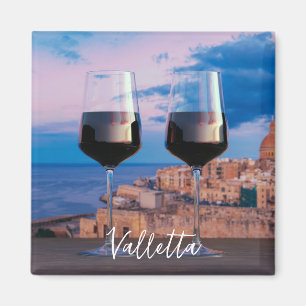 Imán Gafas de vino con vistas a la puesta de sol sobre