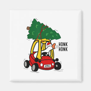 Imán Ganso tonto conduciendo coche de juguete con árbol