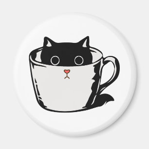 Imán Gatito negro con nariz roja escondido en una taza
