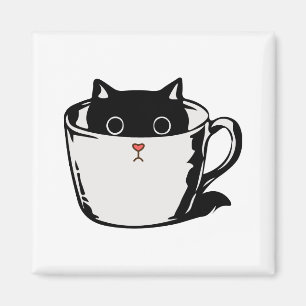Imán Gatito negro con nariz roja escondido en una taza