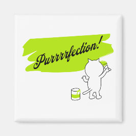 Imán Gatito pintando "¡Purrrfection!" en la pared.