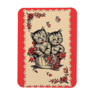 Imán gatitos adorables en una cesta de flores
