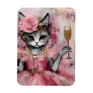 Imán Gato con vestido rosa con una bebida dorada