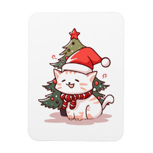 Imán Gato lindo con sombrero de Santa cerca del árbol d