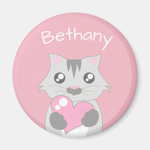Imán Gato lindo sosteniendo el corazón rosado