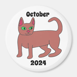 Imán gato, marrón, ojos verdes, cola, octubre de 2024