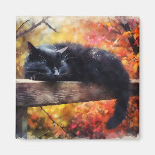 Imán Gato negro durmiente en otoño
