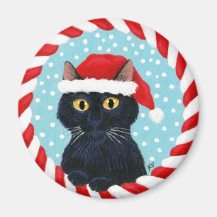 Imán Gato negro lindo, gorra de Santa, nieve del