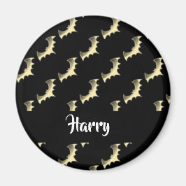 Imán Gold bats on black