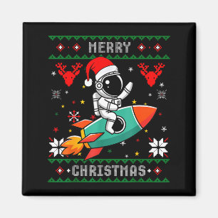 Imán Gorrito feo de Navidad astronauta montando cohete 