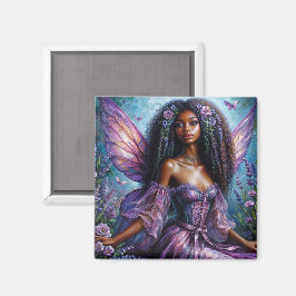 Imán Hada negra con alas y flores moradas
