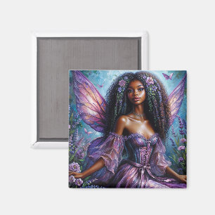 Imán Hada negra con alas y flores moradas