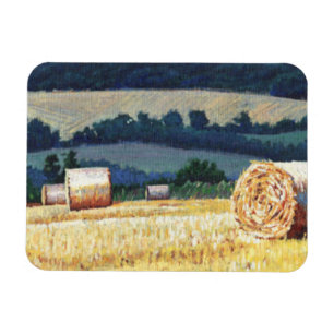 Imán Haybales en el aceite de la ladera en lona