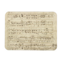 Hoja de música en pergamino manuscrita en tinta