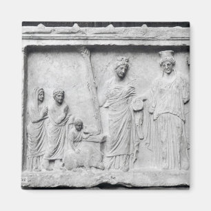 Imán Hombre, mujer y niño antes de un altar