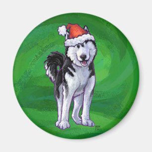 Imán Husky festivo en Santa Hat en Green