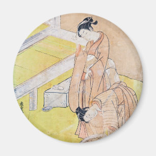 Imán Joven Chica lanza pez dorado a imanes de estanques