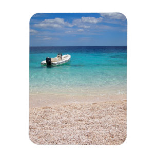 Imán Lancha de carreras en el mar azul